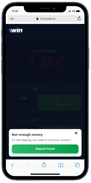 A smartphone displaying casino site with popup window 'Not enough money to start playing game'